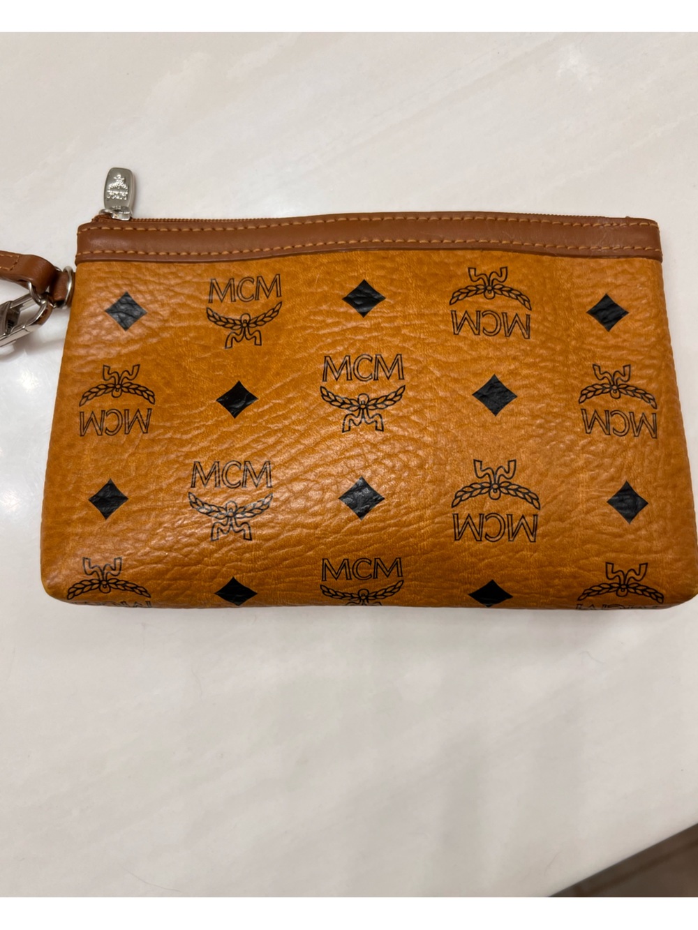 MCM Cognac Logo Print Leather Wristlet in Black Accents